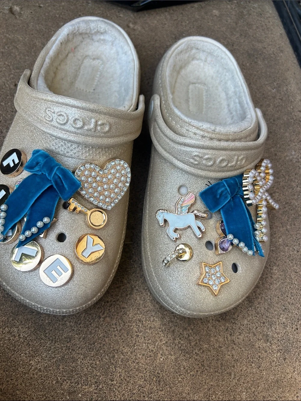 CROCS Kids Gold Glitter Clogs with Blue Velvet Charms